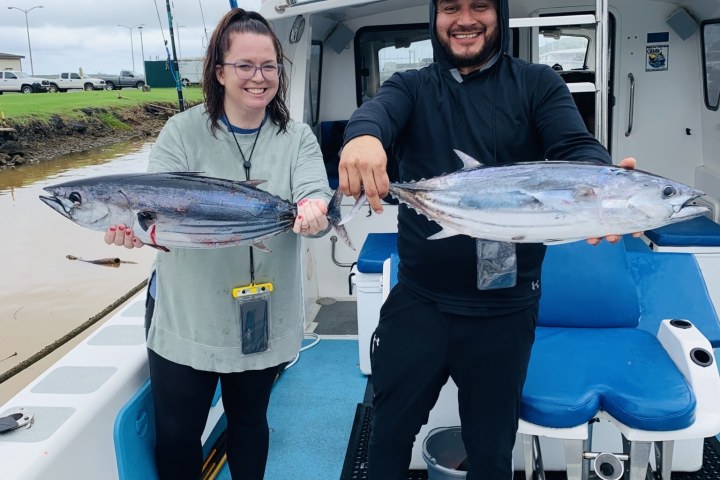 a group of people sitting at a table