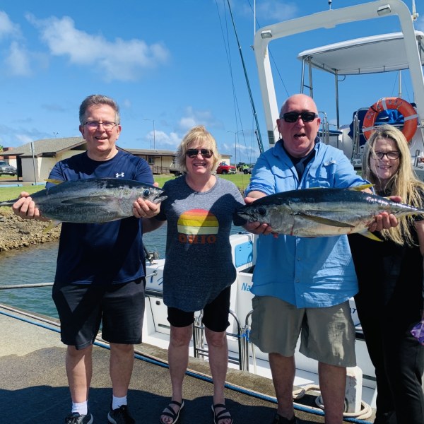 a person holding a fish