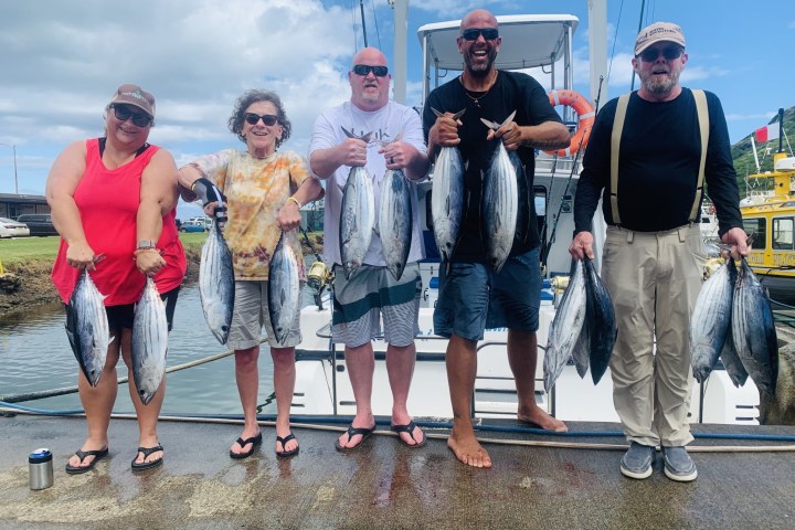 a group of people posing for the camera