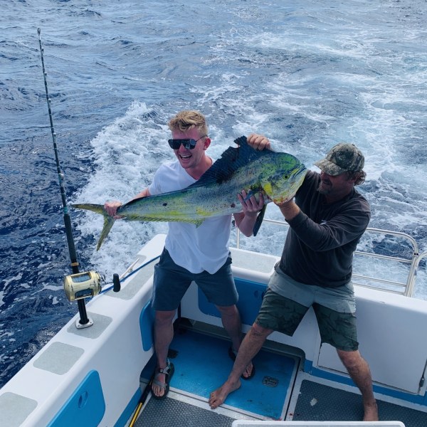 a person standing on a boat in the water