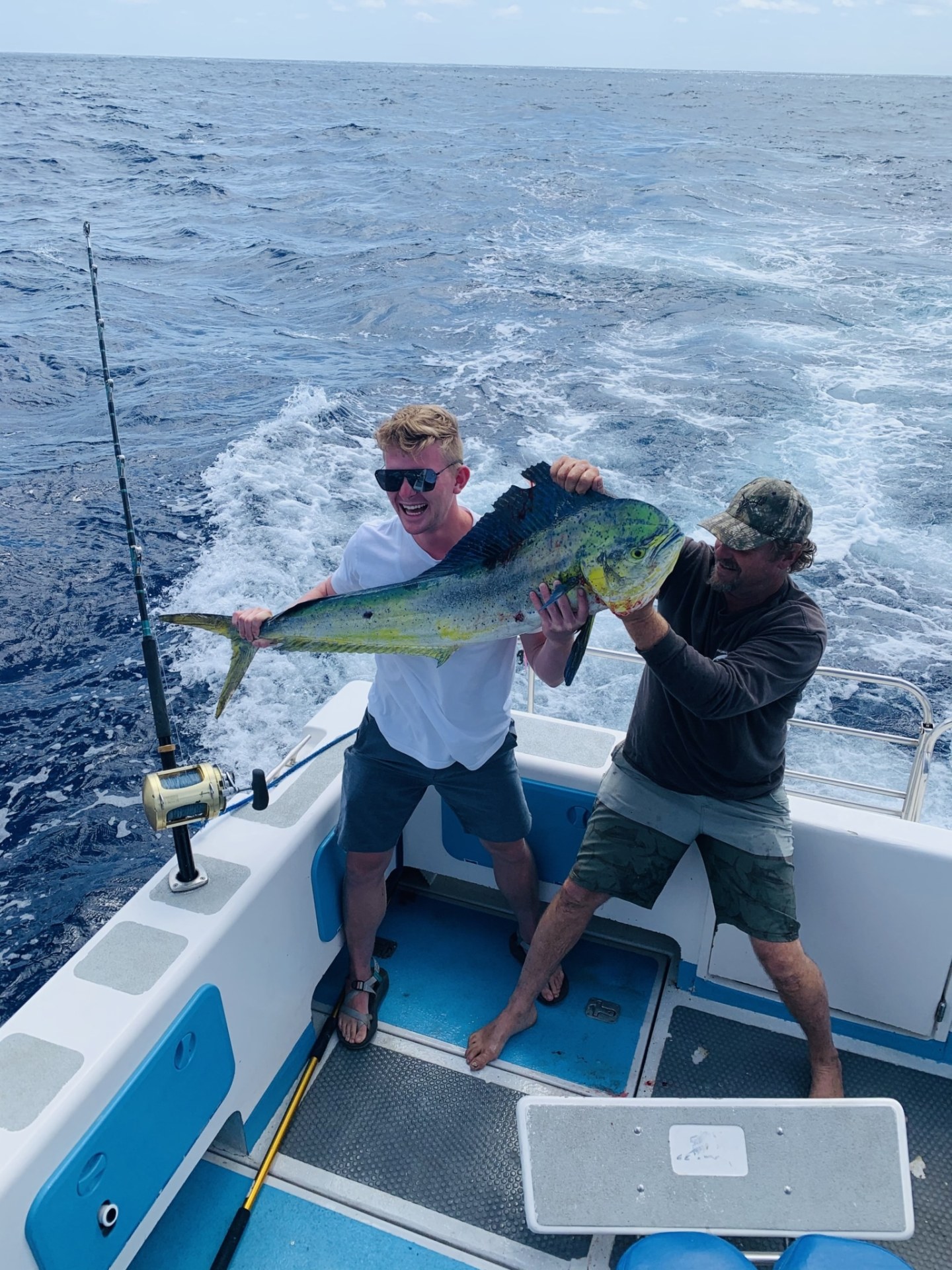 a person standing on a boat in the water