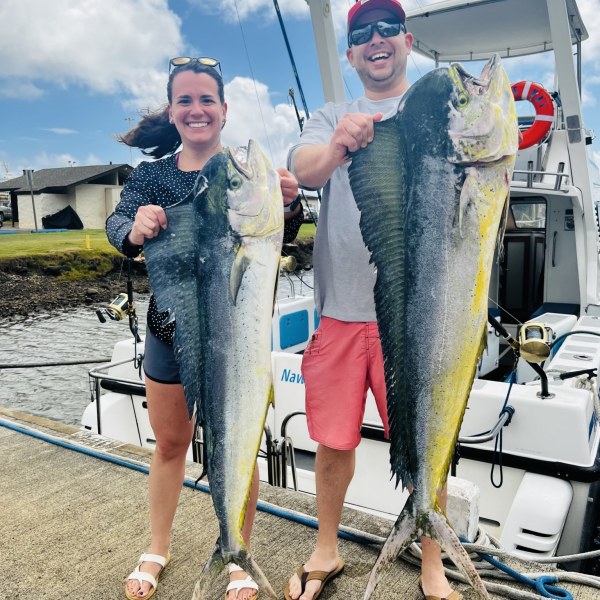 a person holding a fish