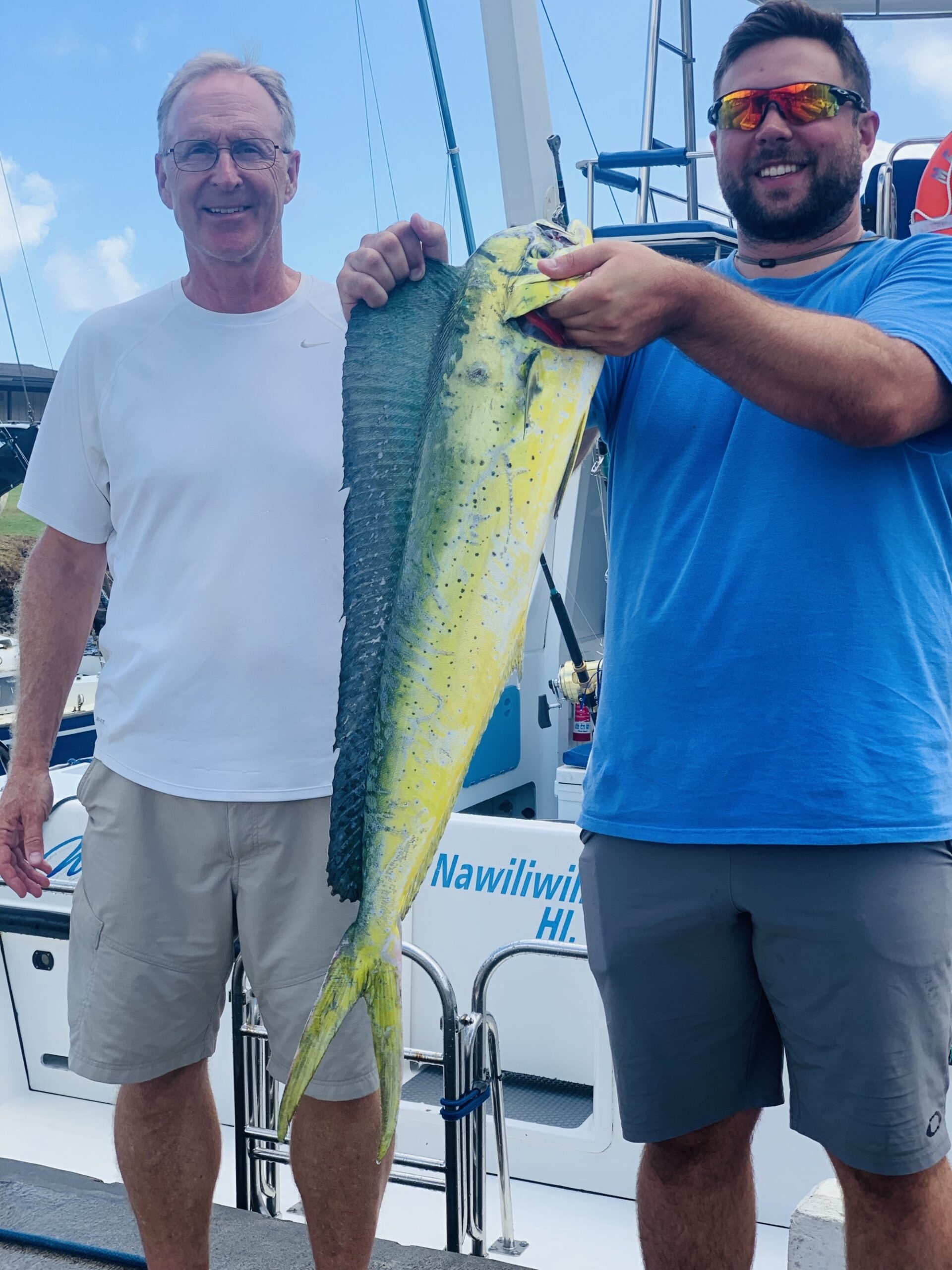 a man holding a fish