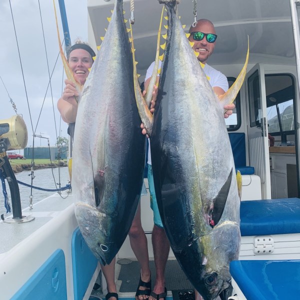 a person holding a fish