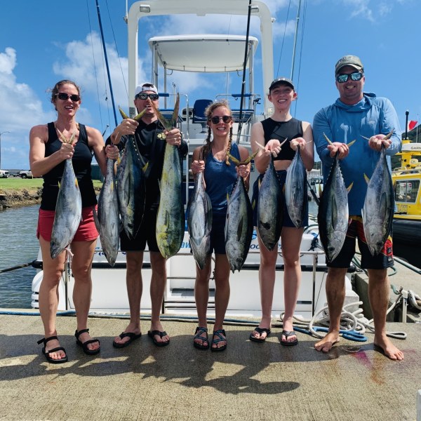 a group of people posing for the camera