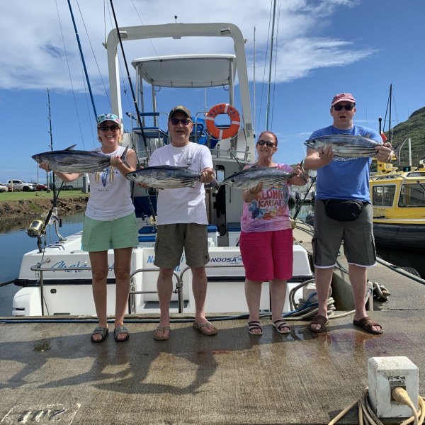 a group of people standing on a swing
