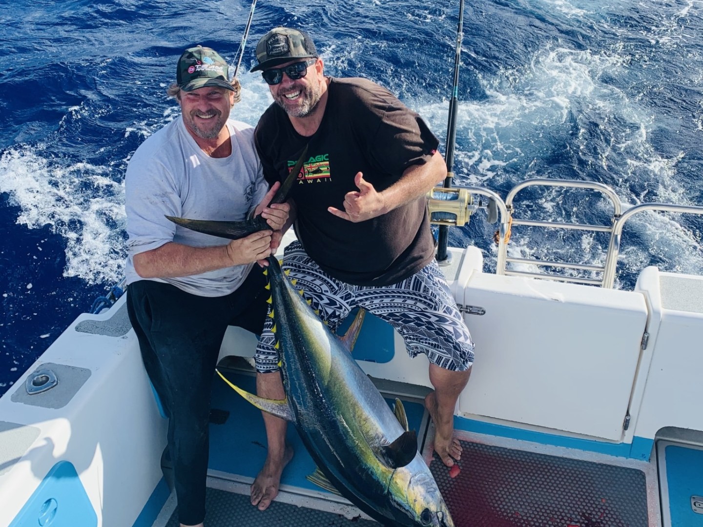 a person holding a fish