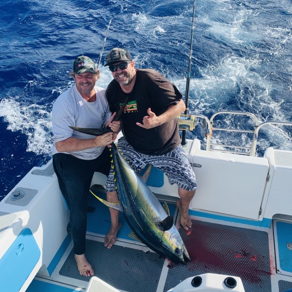 a person holding a fish